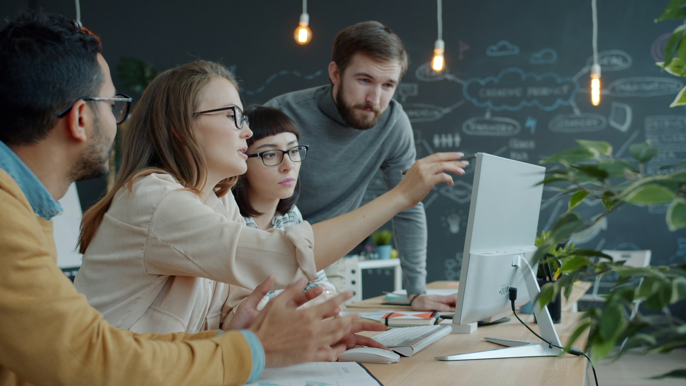 A development team reviewing a build together